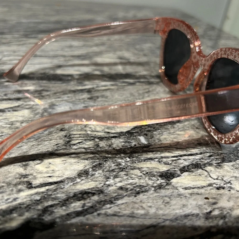 Stylish Pink Sunglasses with Star Accents